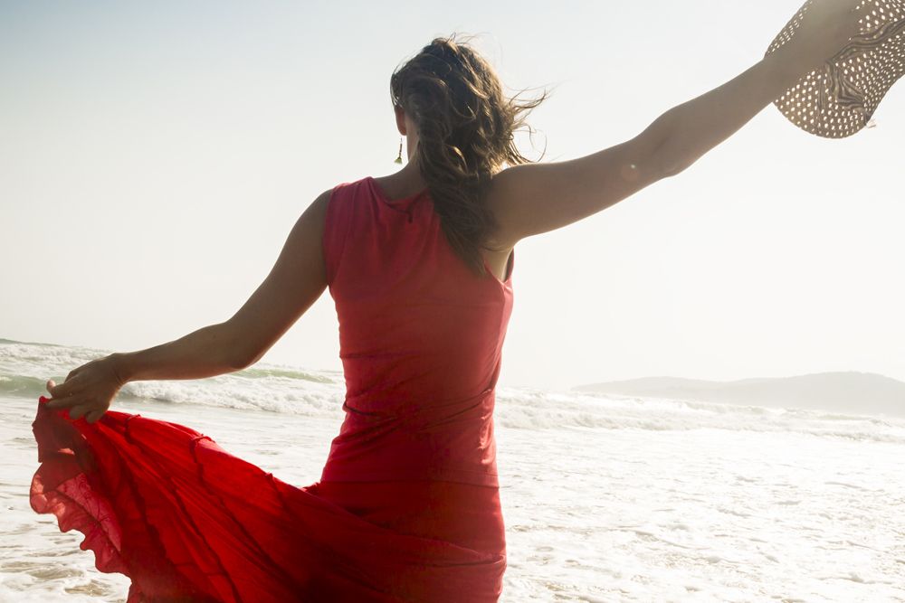 Woman walking on beach